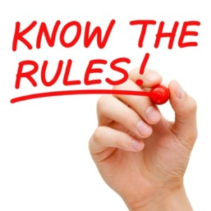 hand writing the phrase, "know the rules"