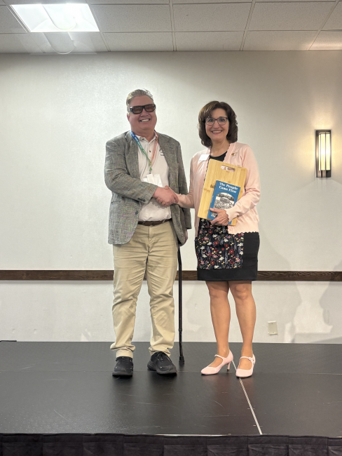 Kevin Jarek receiving an award.